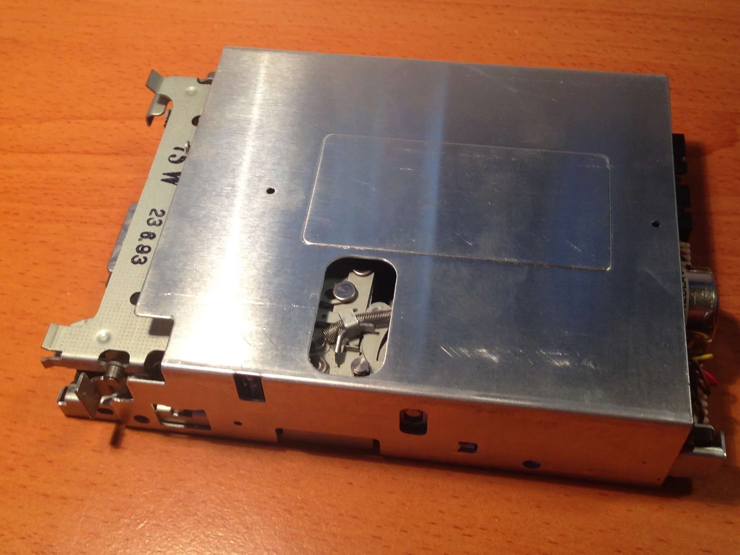 Apple 3.5 Drive External Floppy Drive Teardown, Removing the Top Cover From Floppy Mechanism: step 11, image 1 of 3