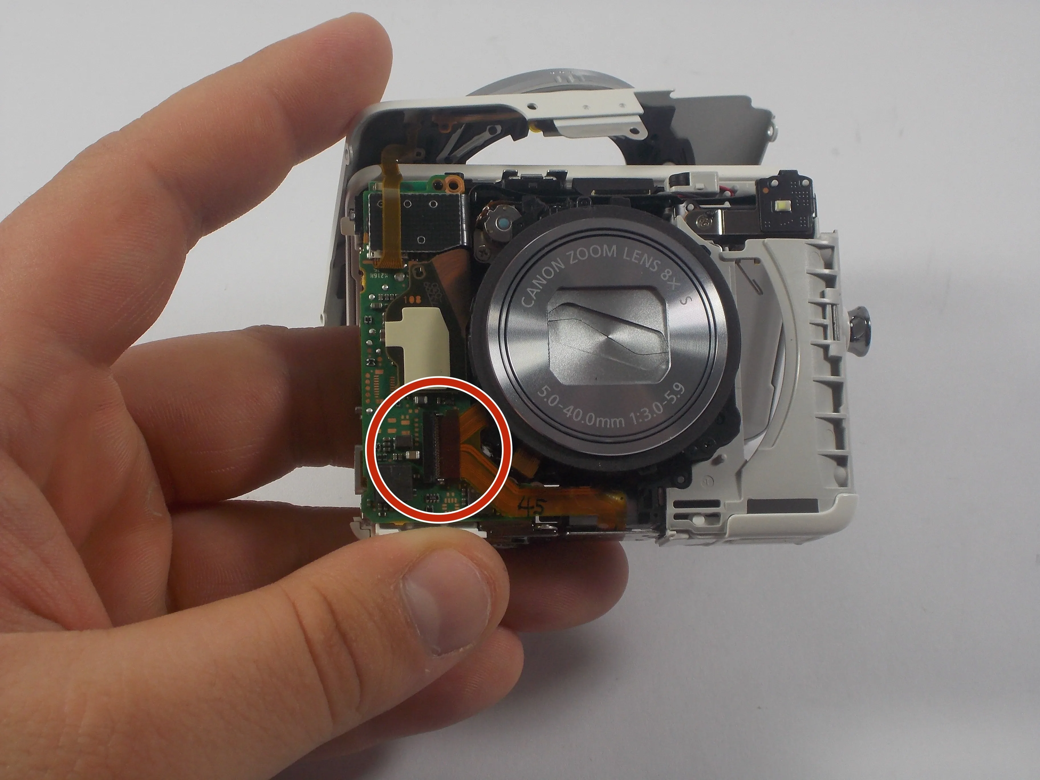 Canon PowerShot N Разборка: шаг 13, изображение 1 из 1