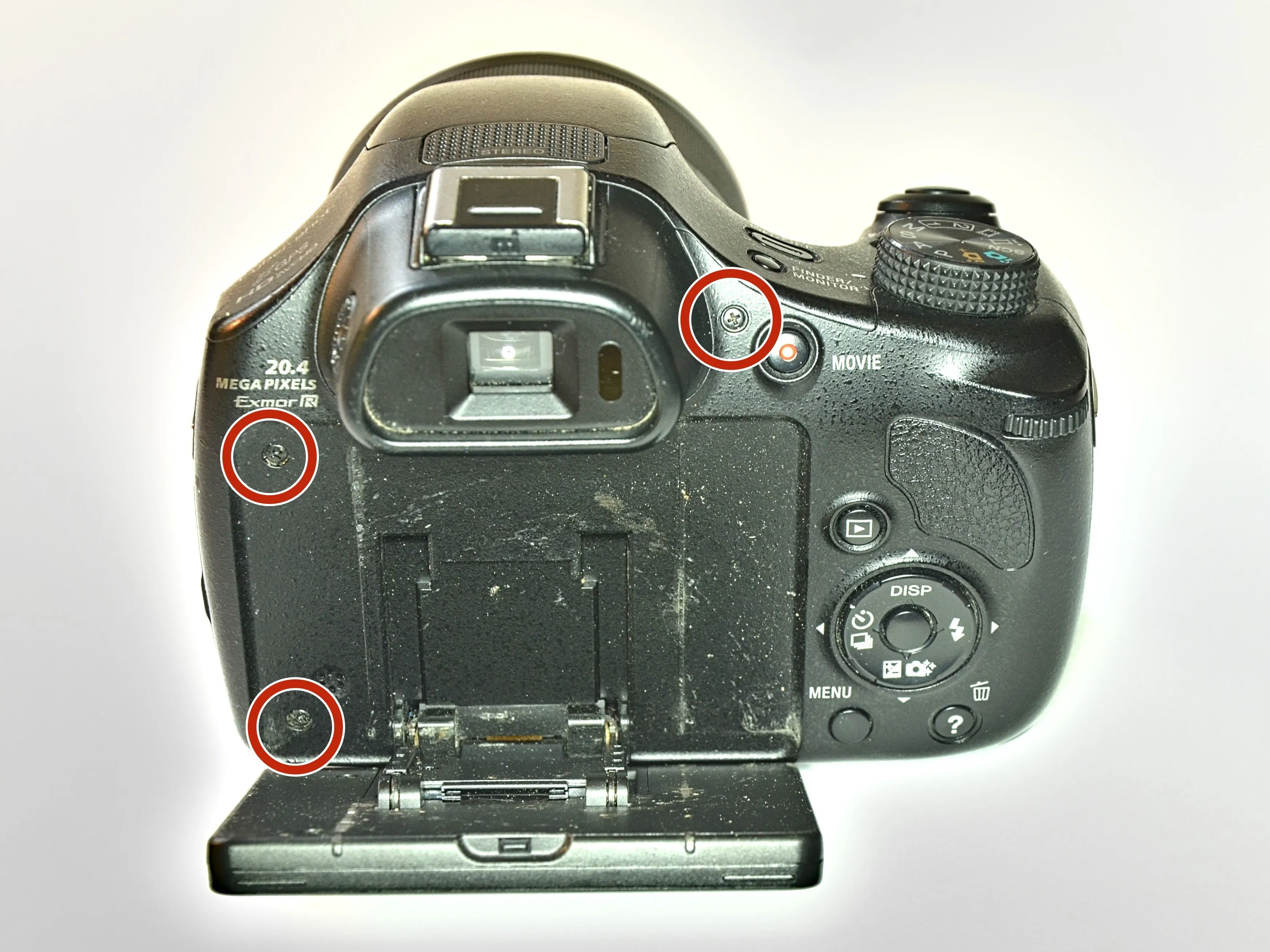 Sony Cyber-shot DSC-HX400V Разборка, корпус: шаг 2, изображение 1 из 3