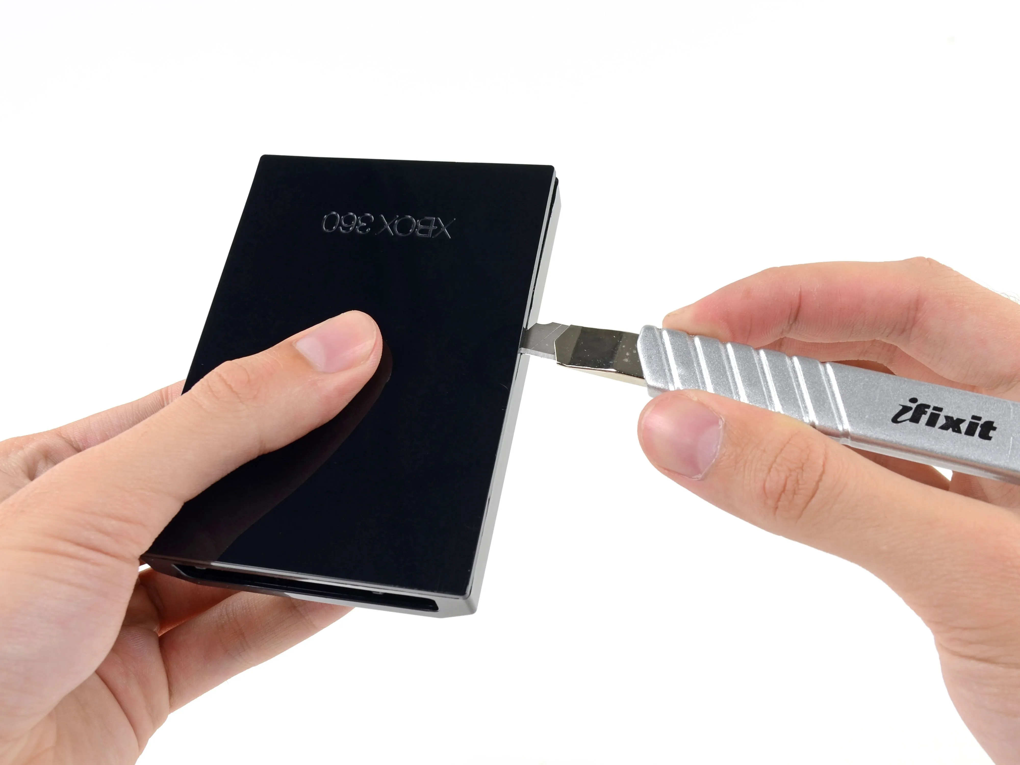 Разборка Xbox 360 E: шаг 5, изображение 1 из 3